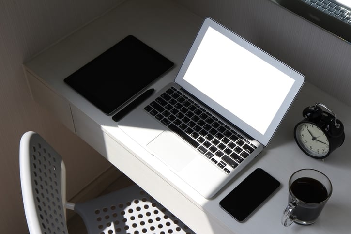 blank screen laptop computer and smart phone and digital tablet and stylus pen is on wooden desk as workplace concept.jpeg
